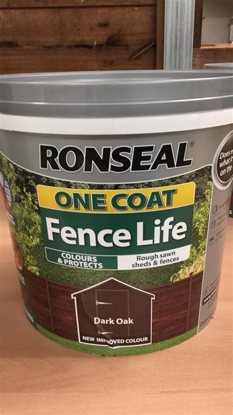 sprayable fence paint dark oak.